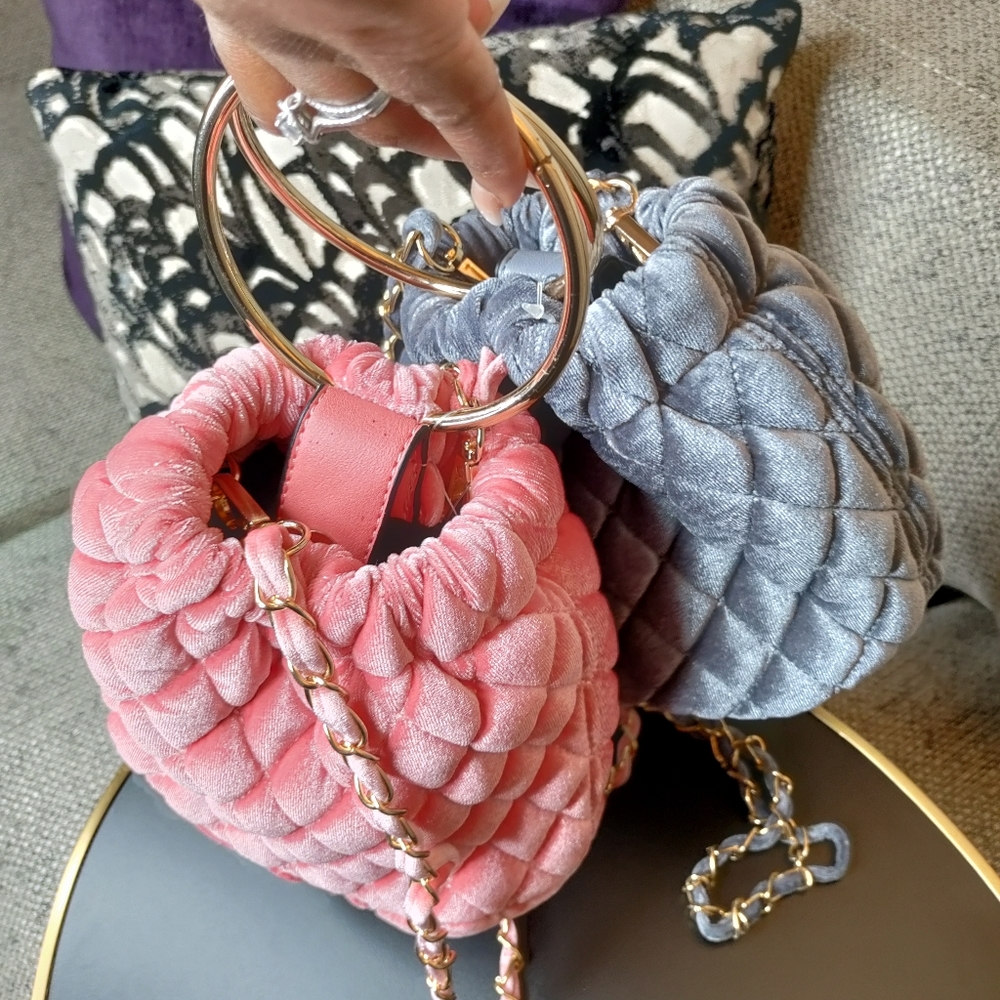 Gray and pink satchel bags